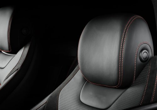 Modern,Race,Car,Black,And,Red,Perforated,Leather,Interior.,Part